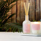 Pier 1 Unwind Rose & Tonka Aromatherapy 9.5 oz Candle