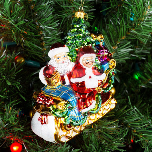 Pier 1 Santa and Mrs Claus on a Sleigh Ride Glass Christmas Ornament - Pier 1